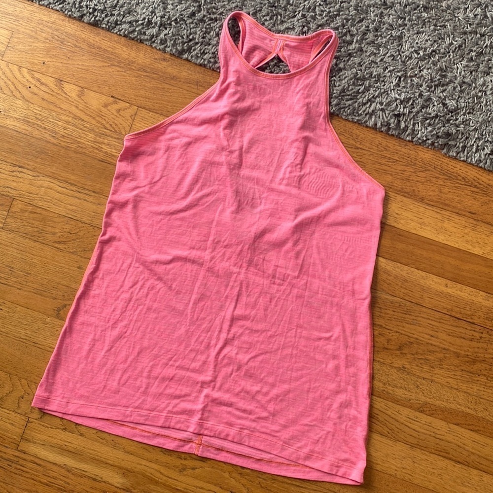 Lululemon coral pink Racerback tank with cutout and twist design size Medium